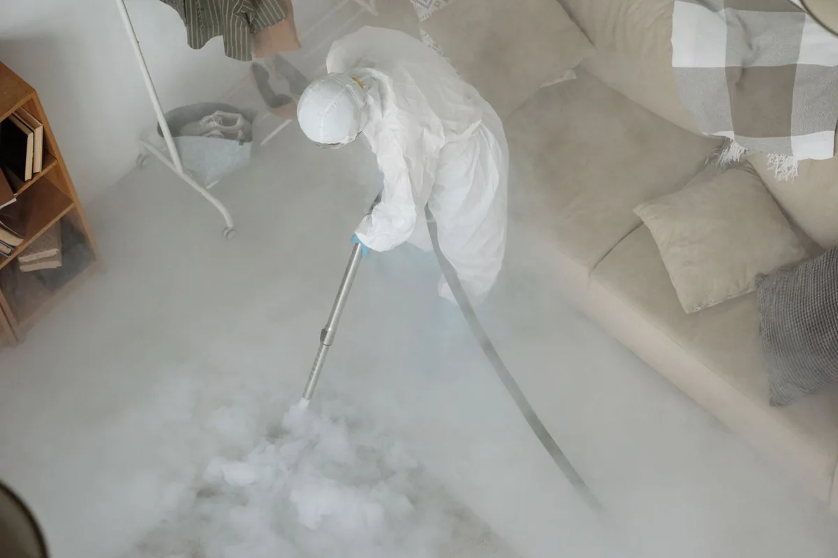 Biohazard cleanup technician in protective equipment, Nesconset, NY